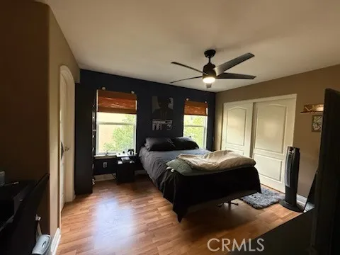 a bed room with a bed and a window