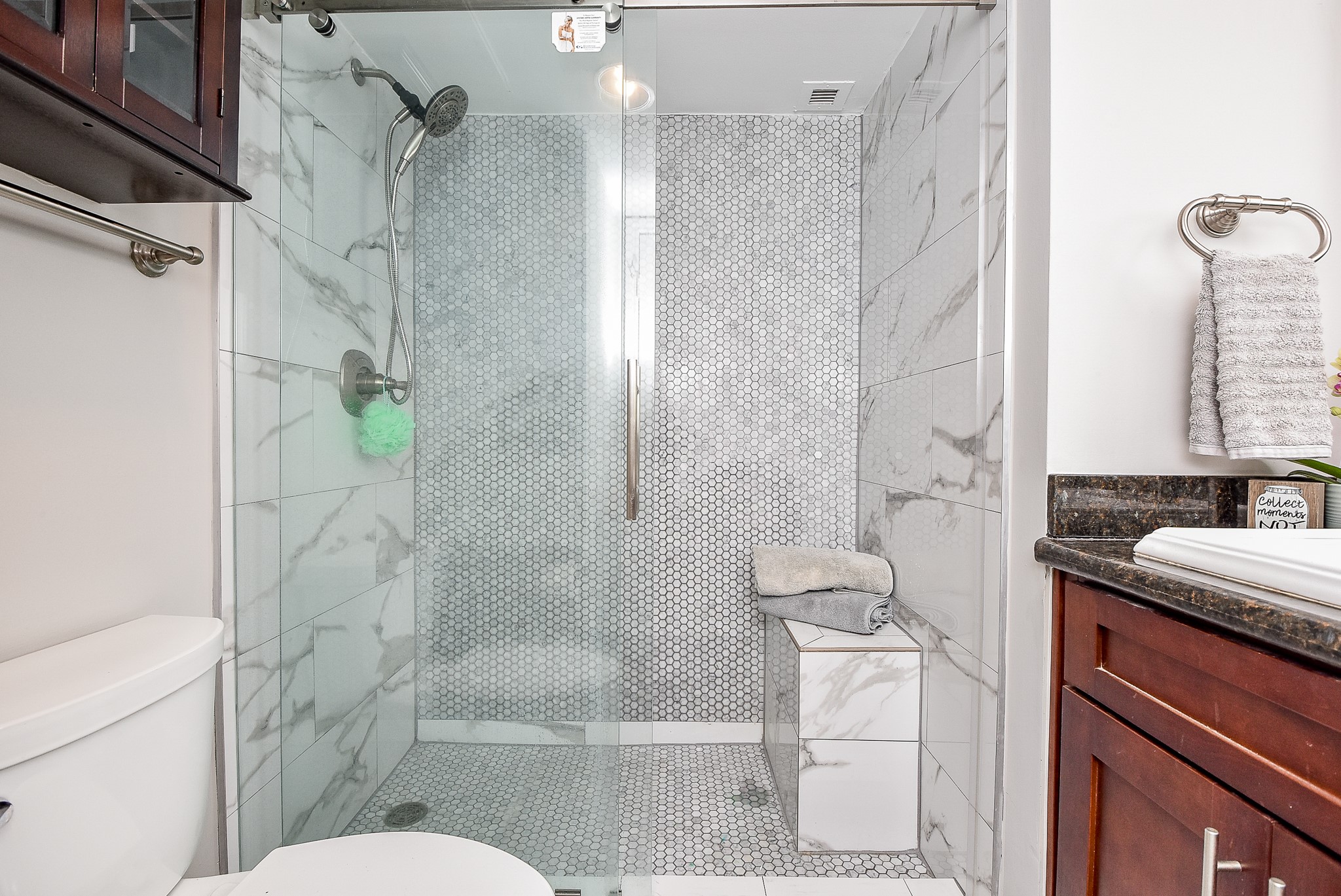 3525 Sage Road, Unit 1407 Houston, TX 77056 - Photo 19 of 34 a bathroom with a granite countertop sink toilet and shower