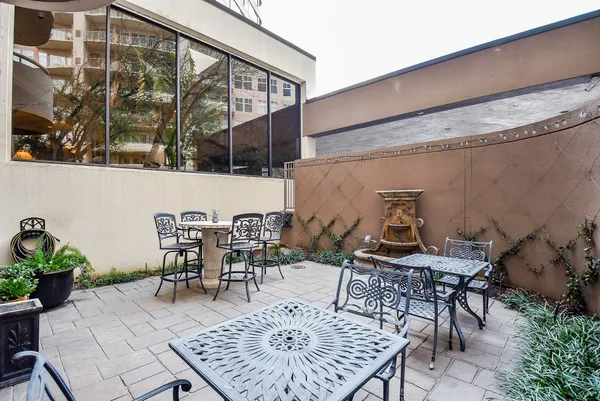 a bedroom with a bed and a bookshelf