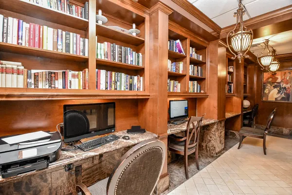 a room with gym equipment and a large window