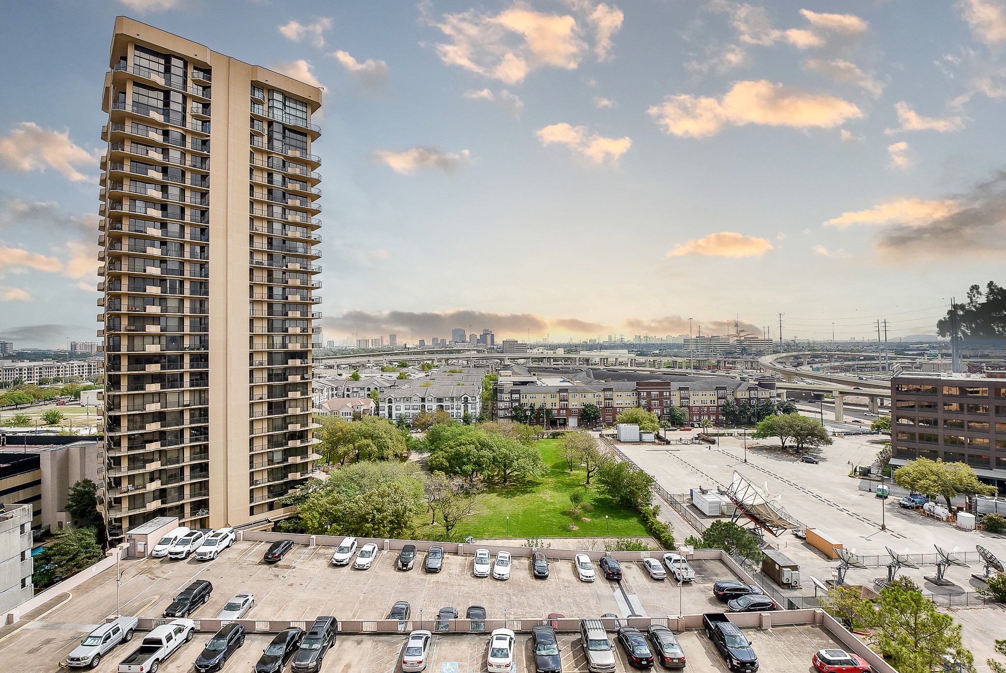 3525 Sage Road, Unit 1407 Houston, TX 77056 - Photo 3 of 34 a view of a city with tall buildings