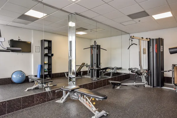 a view of a room with gym equipment