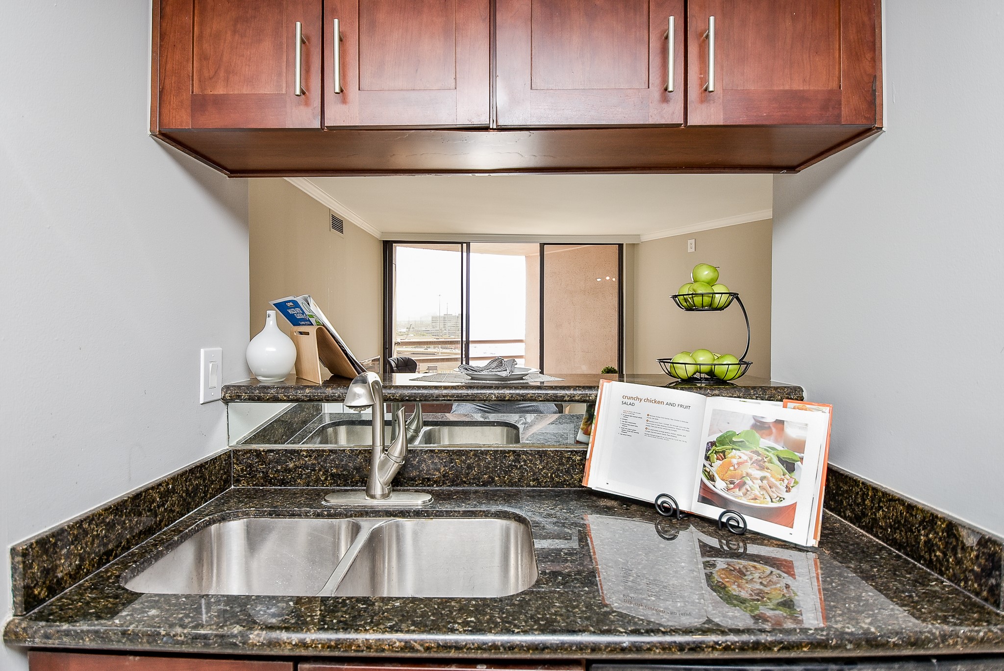 3525 Sage Road, Unit 1407 Houston, TX 77056 - Photo 8 of 34 a kitchen with a sink a stove and cabinets