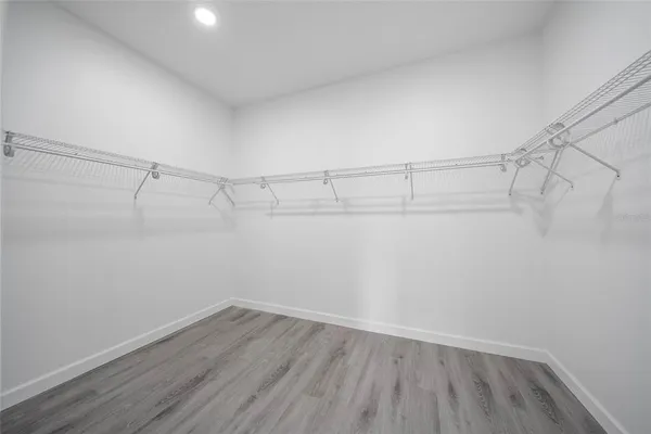 a view of a room with racks on the wall