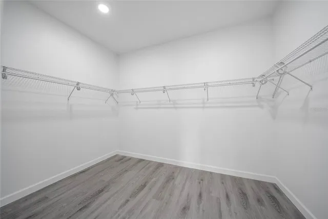 a view of a room with racks on the wall