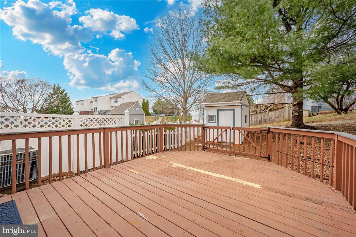 1184 Heathfield Road Sykesville, MD 21784 - Photo 39 of 56 a balcony with wooden floor and fence