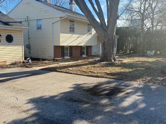 a view of entrance gate of a house