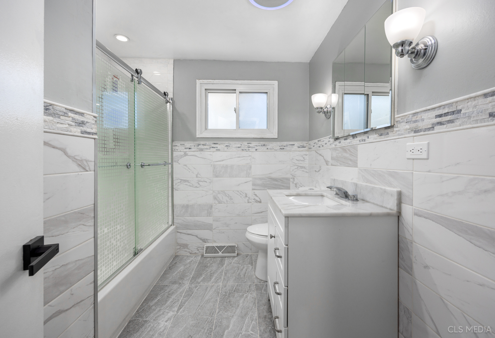 20 North Albert Street Mount Prospect, IL 60056 - Photo 12 of 25 a bathroom with a sink a toilet and shower