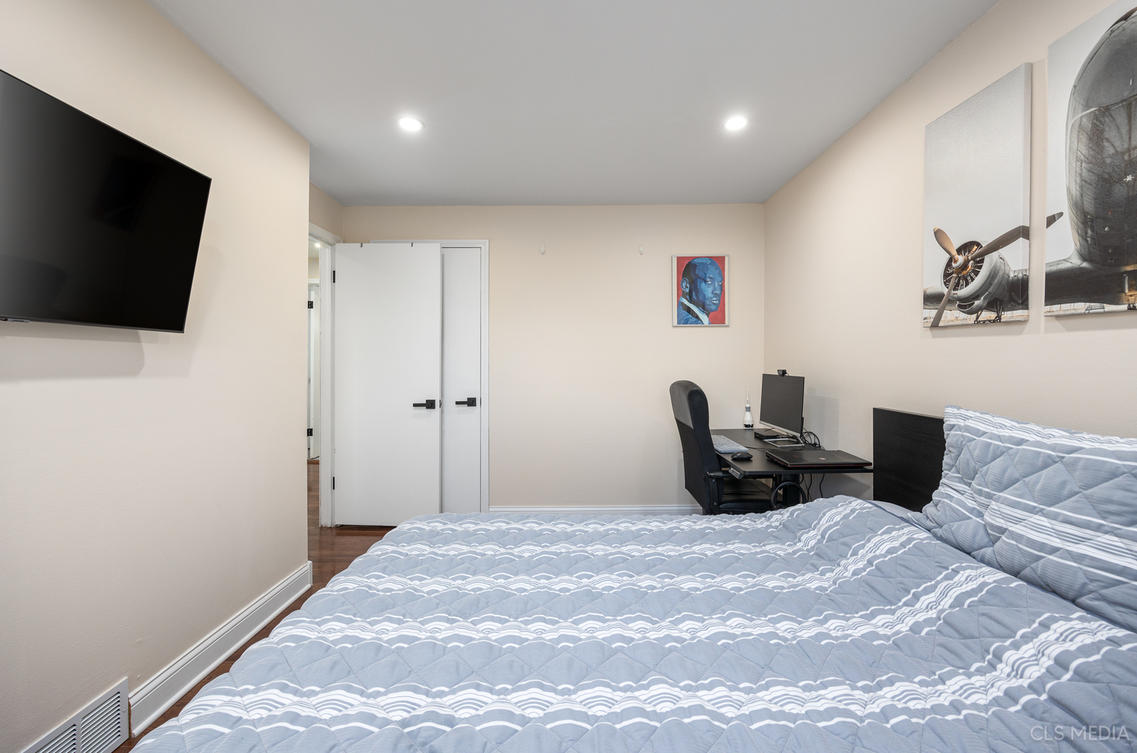 20 North Albert Street Mount Prospect, IL 60056 - Photo 14 of 25 a bedroom with a bed and a flat screen tv