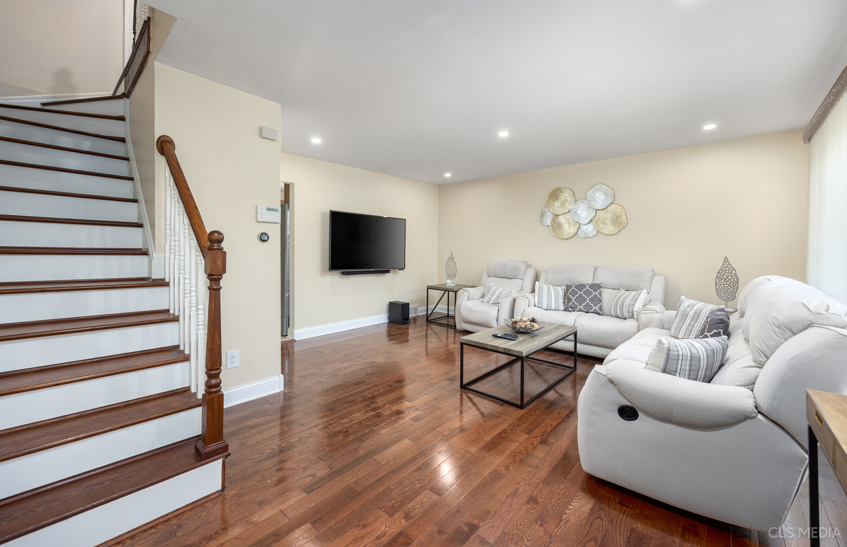 20 North Albert Street Mount Prospect, IL 60056 - Photo 2 of 25 a living room with furniture and a flat screen tv