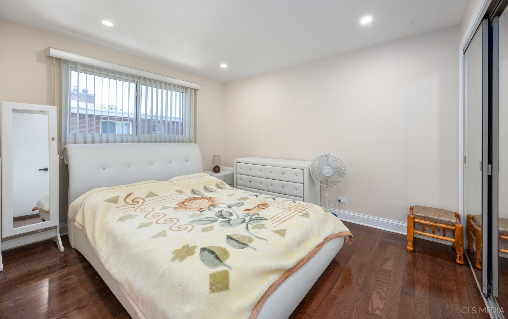 20 North Albert Street Mount Prospect, IL 60056 - Photo 10 of 25 a bed sitting in a bedroom next to a window