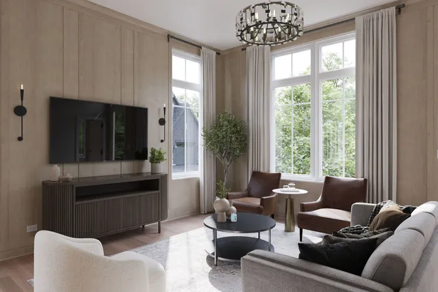 a living room with furniture and a large window