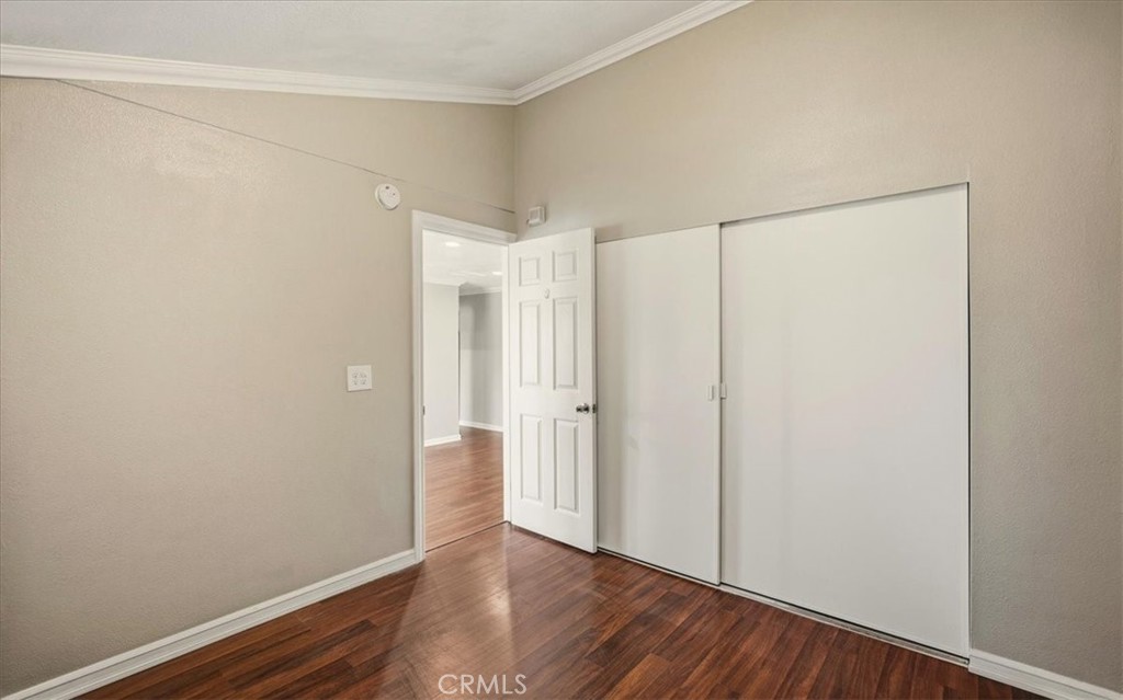 1200 West Lambert Road La Habra, CA 90631 - Photo 16 of 37 a view of an empty room with wooden floor