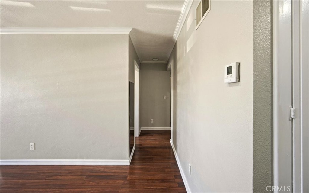 1200 West Lambert Road La Habra, CA 90631 - Photo 17 of 37 a view of a hallway with wooden floor