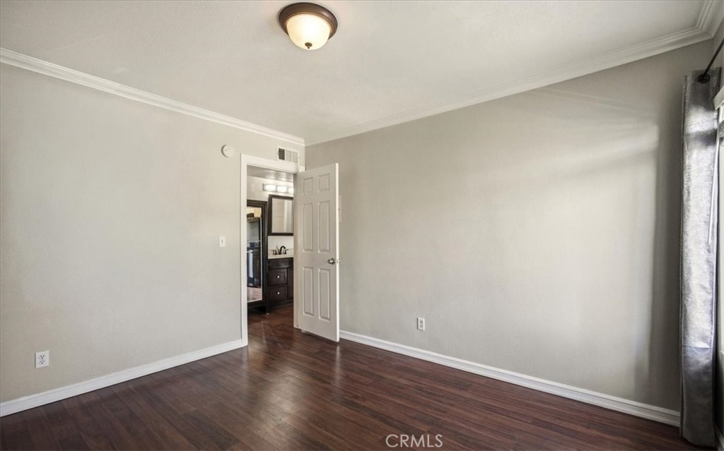 1200 West Lambert Road La Habra, CA 90631 - Photo 23 of 37 a view of an empty room with wooden floor