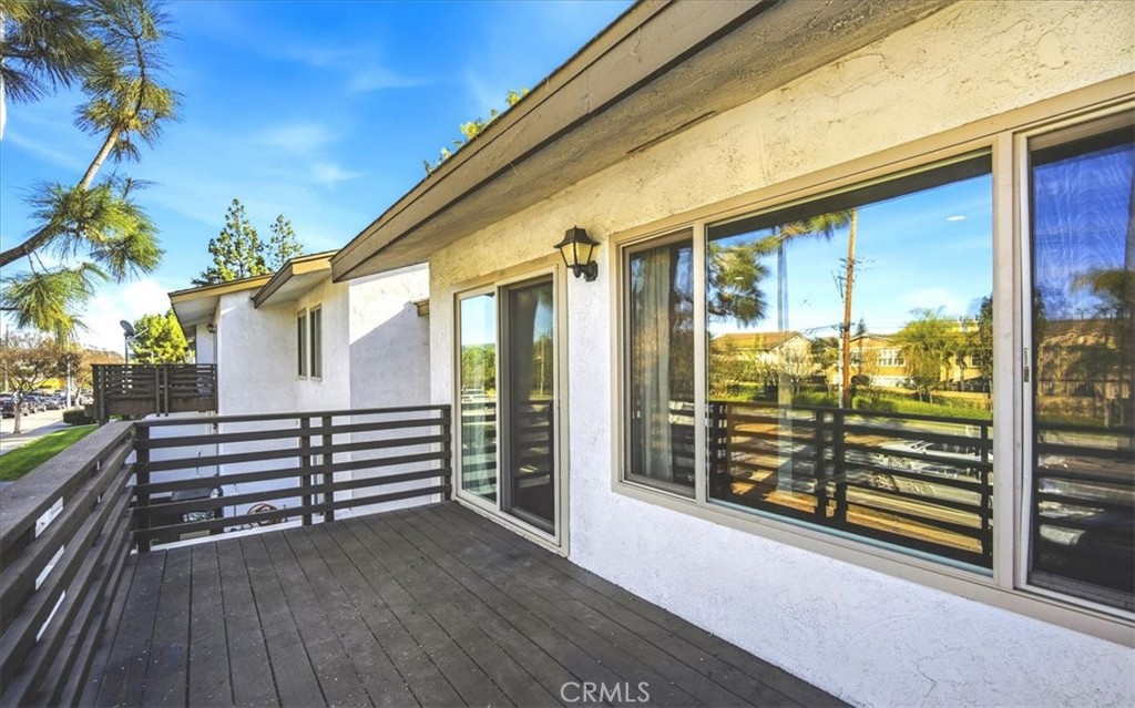 1200 West Lambert Road La Habra, CA 90631 - Photo 25 of 37 a view of a porch with wooden floor and iron stairs