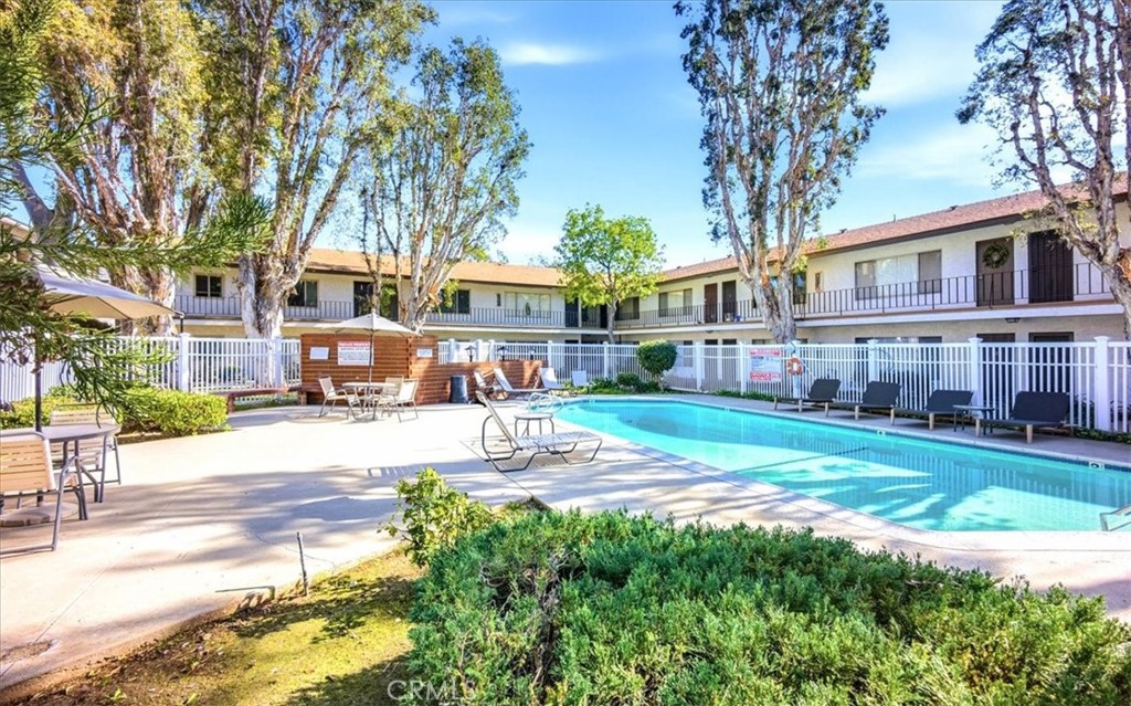 1200 West Lambert Road La Habra, CA 90631 - Photo 30 of 37 a front view of a building with garden and trees