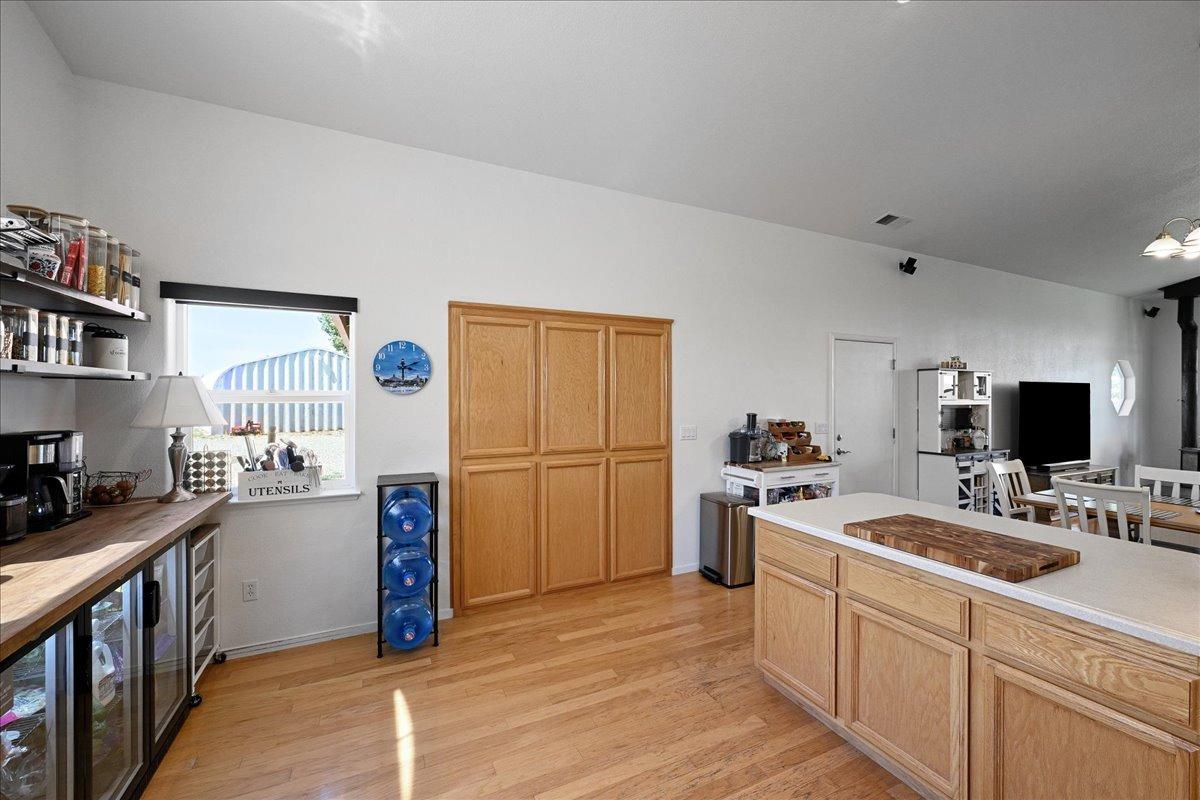 7497 McCourtney Road Lincoln, CA 95648 - Photo 13 of 73 a kitchen with a sink stove and refrigerator