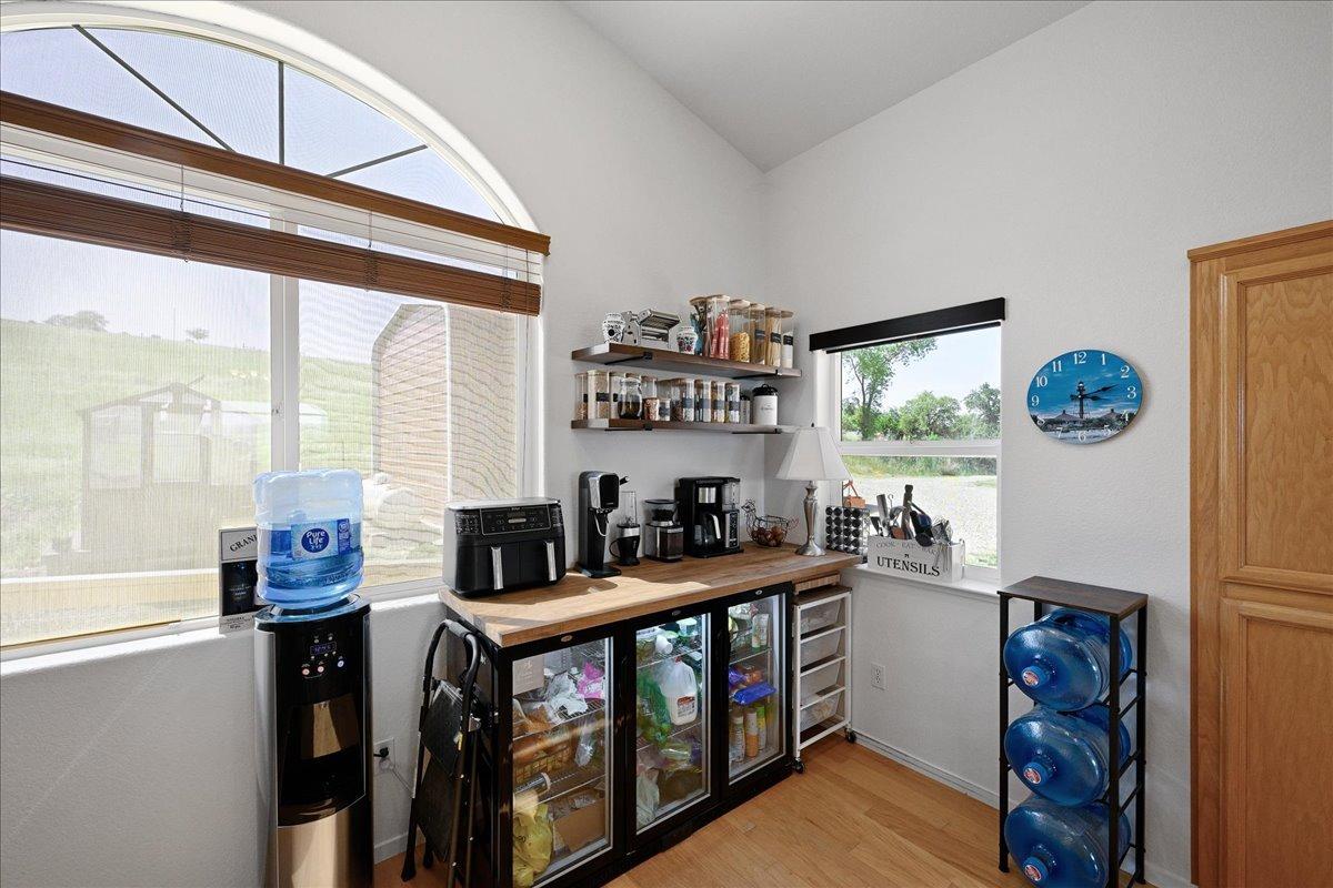7497 McCourtney Road Lincoln, CA 95648 - Photo 18 of 73 a room with furniture a window and a flat screen tv