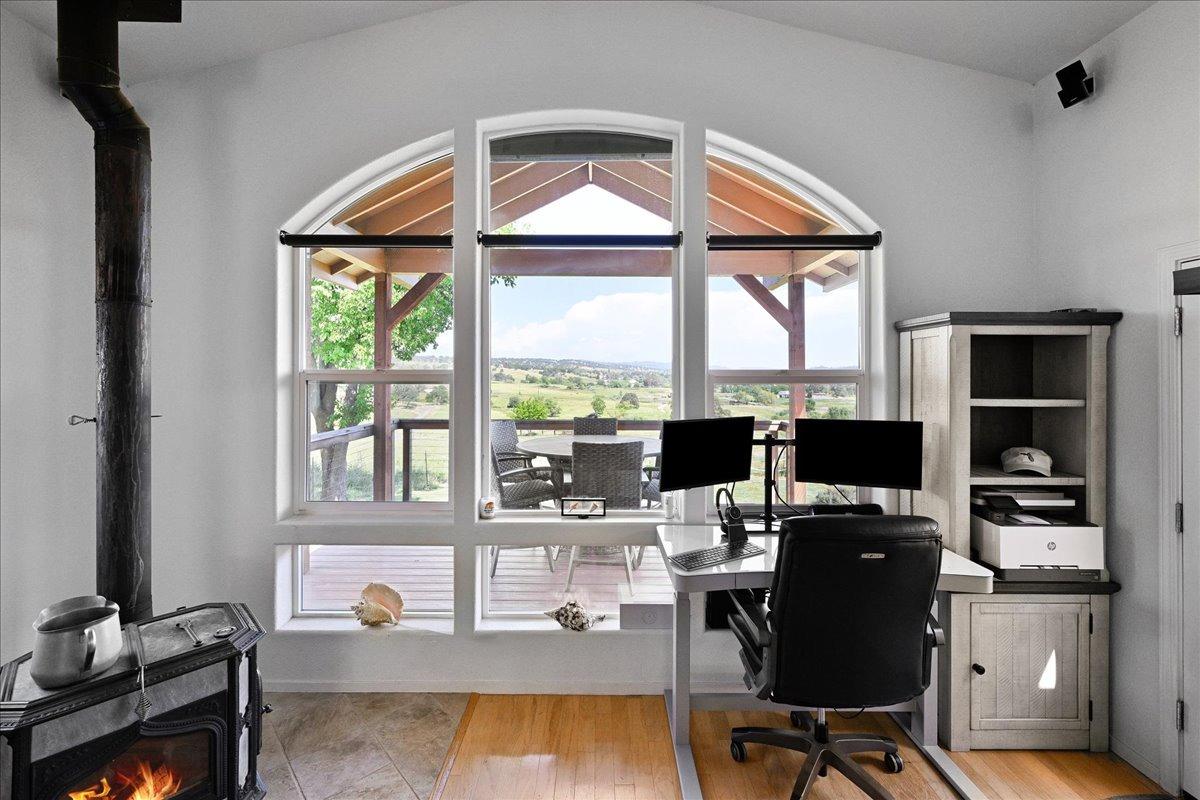 7497 McCourtney Road Lincoln, CA 95648 - Photo 22 of 73 a view of a workspace with furniture and a window