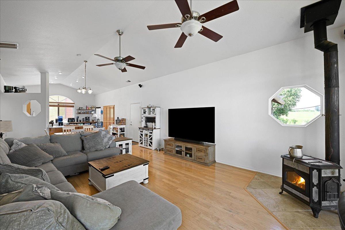 7497 McCourtney Road Lincoln, CA 95648 - Photo 23 of 73 a living room with furniture and a flat screen tv