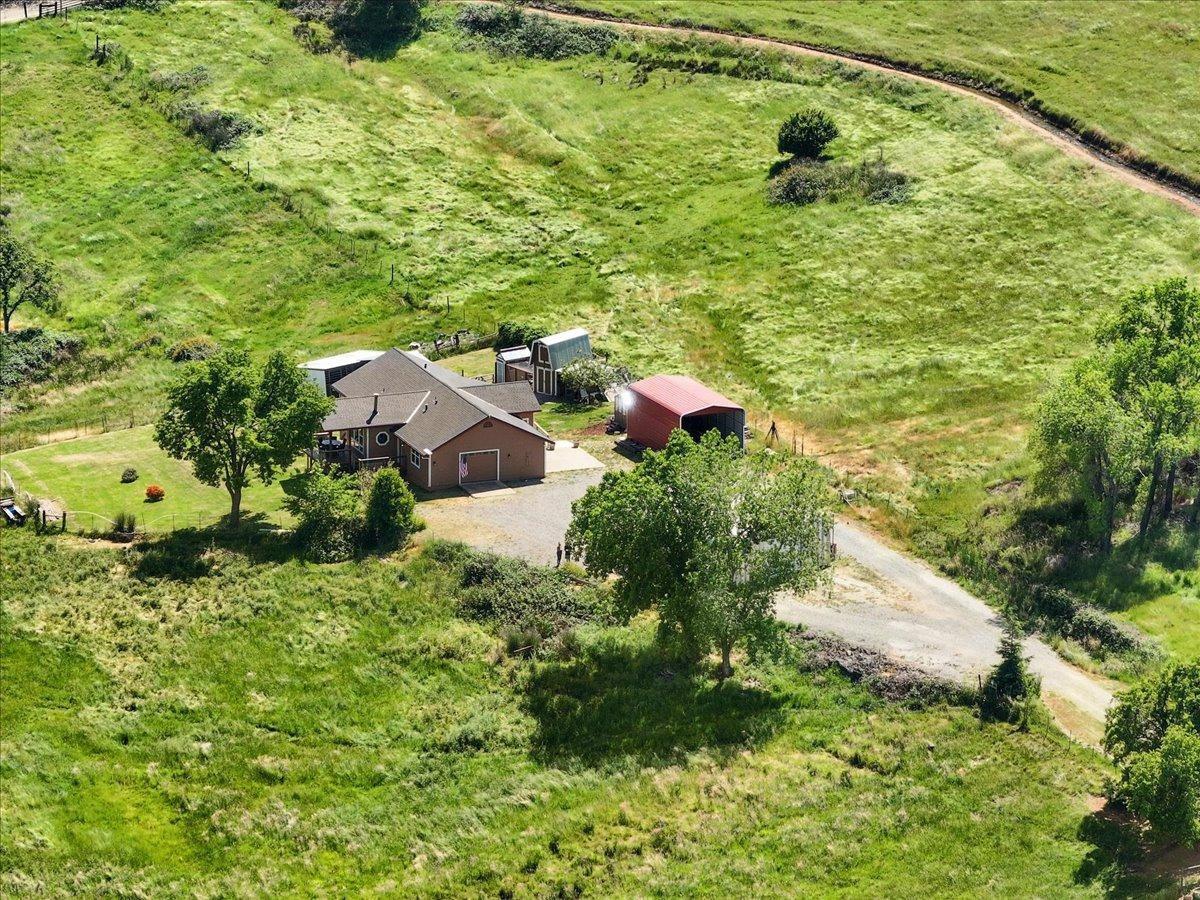 7497 McCourtney Road Lincoln, CA 95648 - Photo 48 of 73 an aerial view of a house with a yard