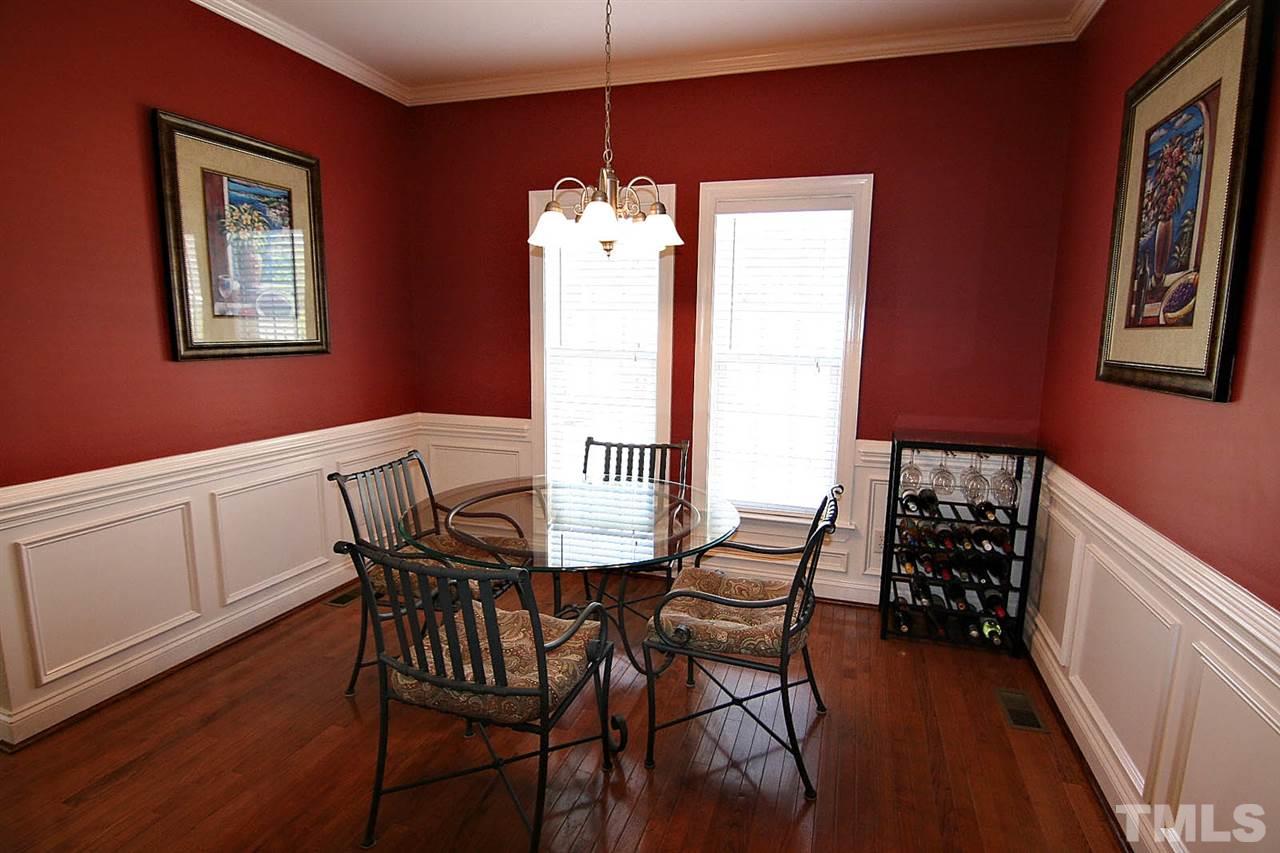 1720 Shell Cracker Drive Willow Spring, NC 27592 - Photo 3 of 10 a view of a dining room with furniture window and wooden floor