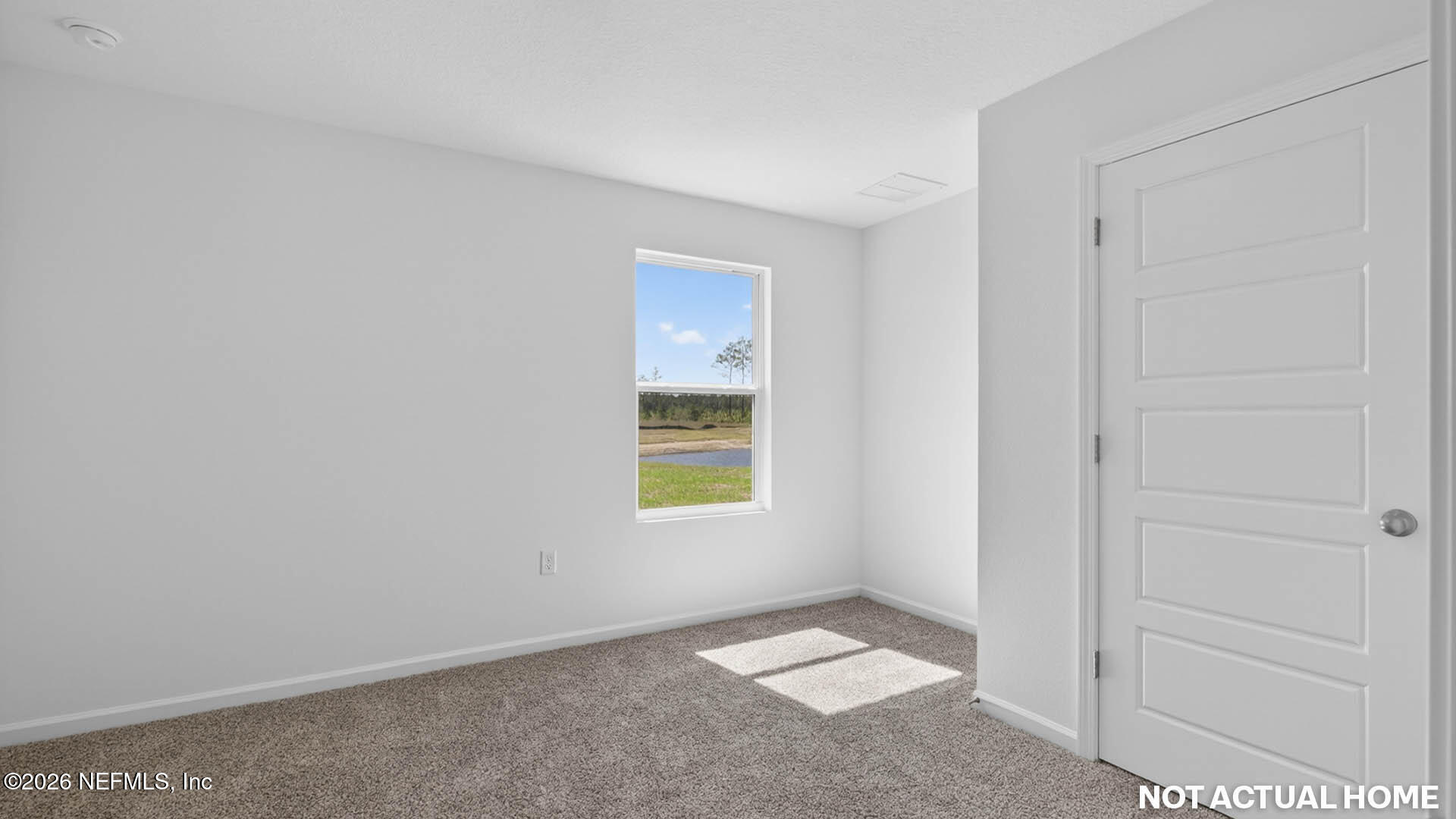 12095 Yew Tree Road Jacksonville, FL 32218 - Photo 24 of 61 an empty room with windows