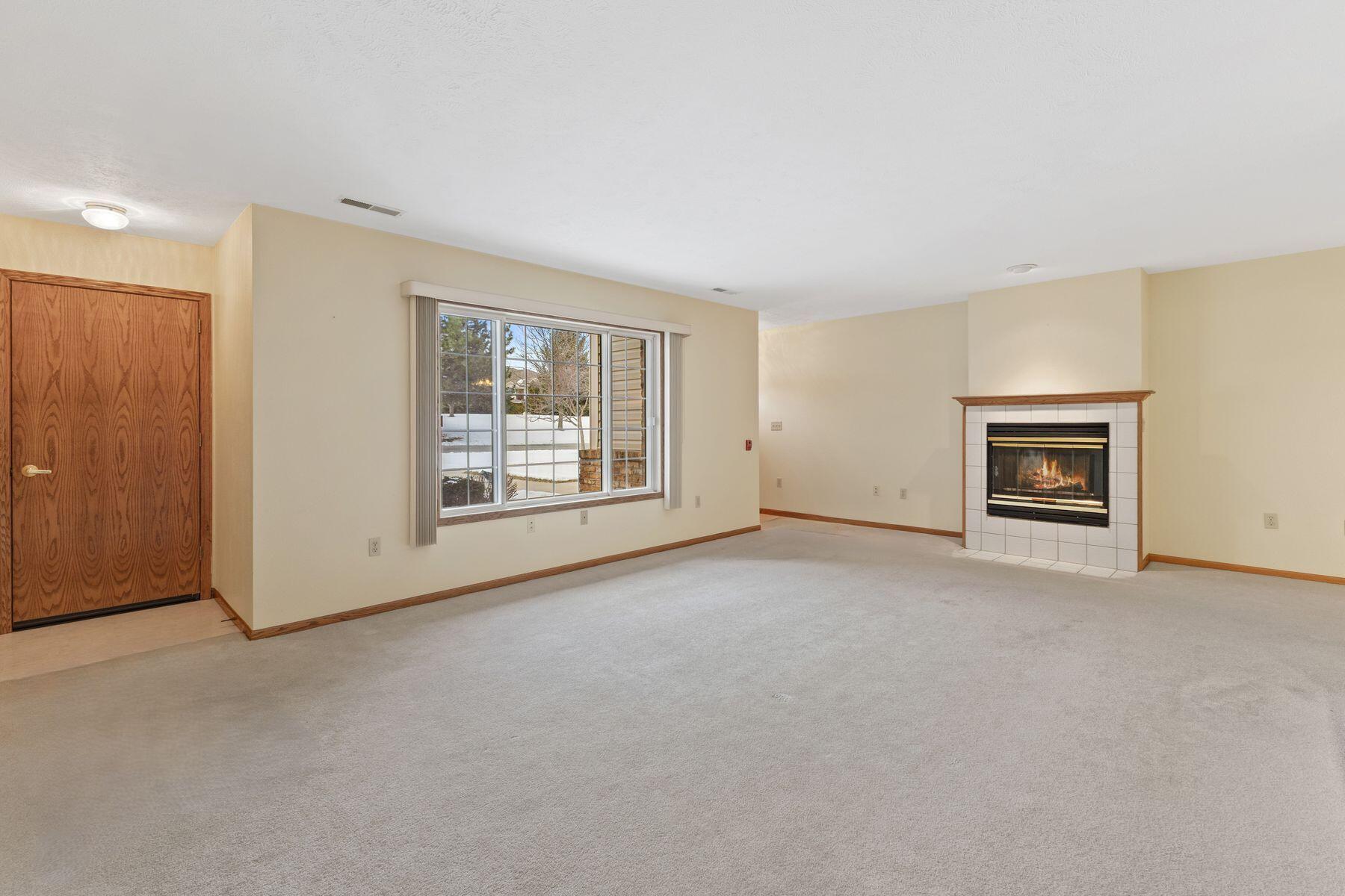 1680 96th Street, Unit 7 Sturtevant, WI 53177 - Photo 5 of 26 Spacious Living Room
