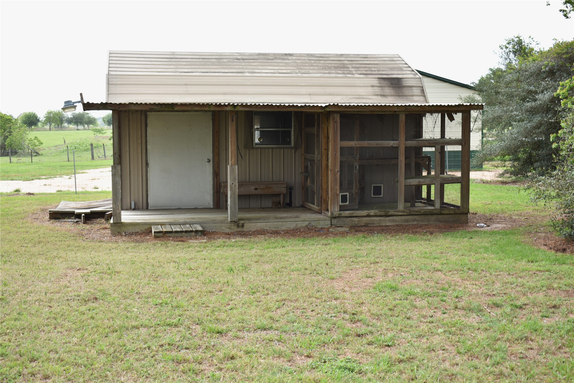 35564 Brumlow Road Hempstead, TX 77445 - Photo 12 of 18 a view of a house with backyard