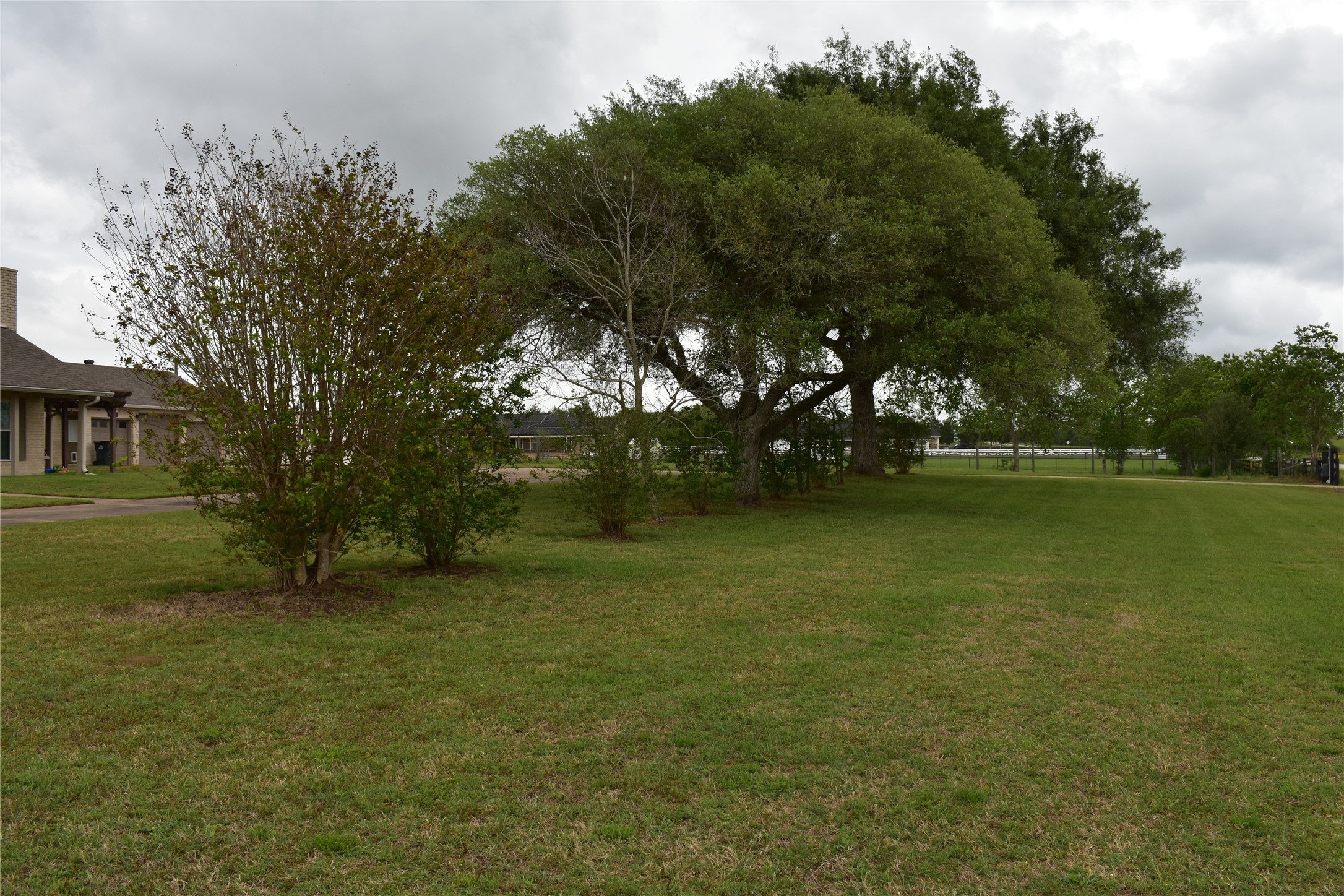 35564 Brumlow Road Hempstead, TX 77445 - Photo 16 of 18 a view of outdoor space with deck and yard