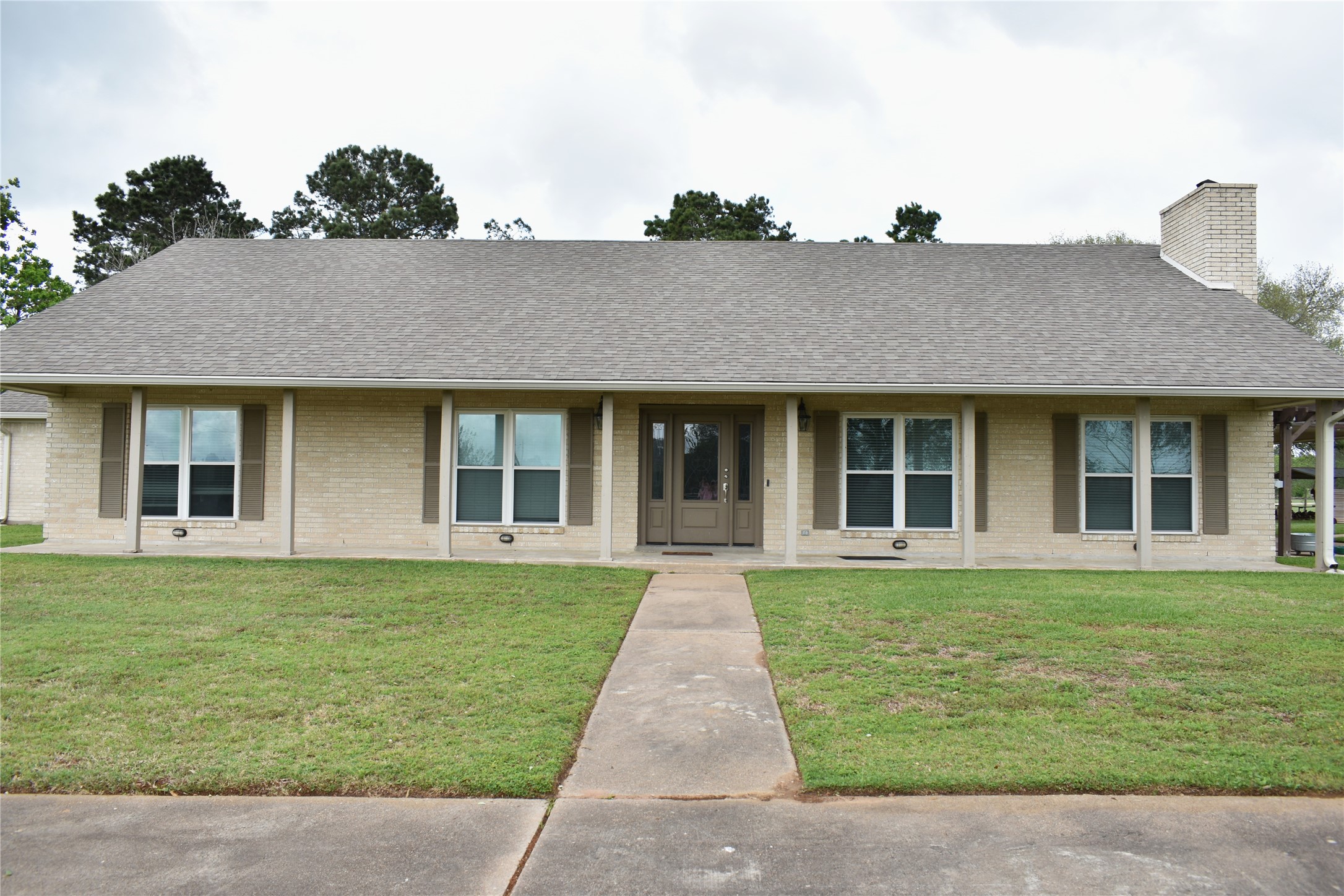 35564 Brumlow Road Hempstead, TX 77445 - Photo 18 of 18 a front view of a house with a garden