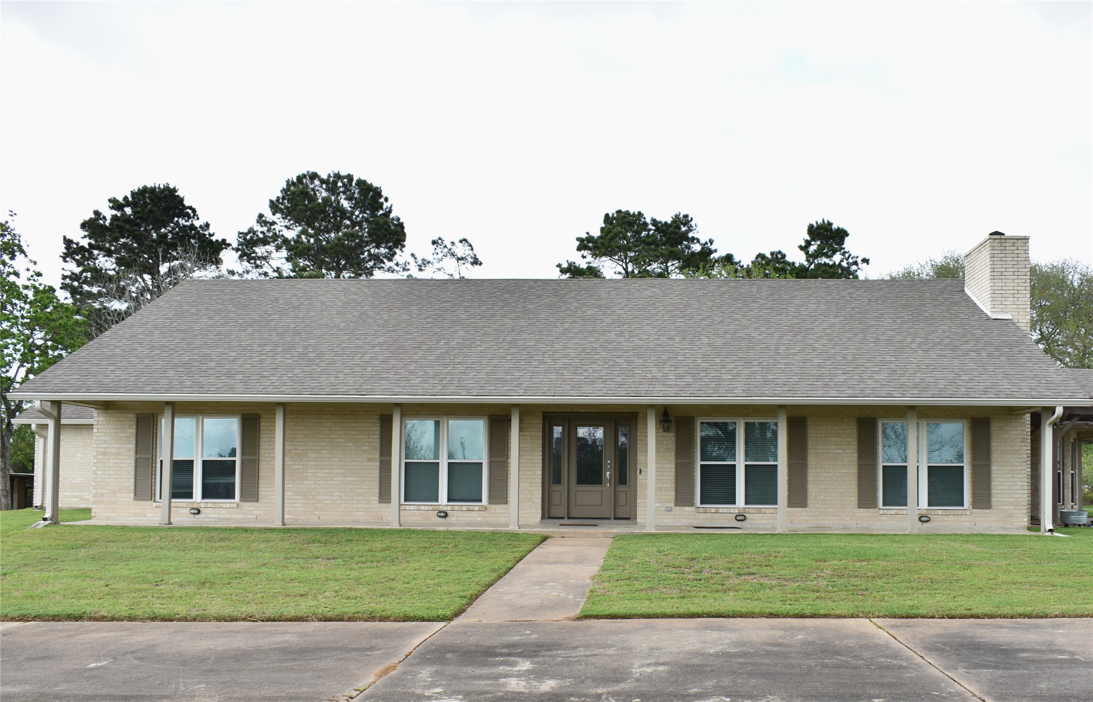 35564 Brumlow Road Hempstead, TX 77445 - Photo 2 of 18 a front view of a house with a garden