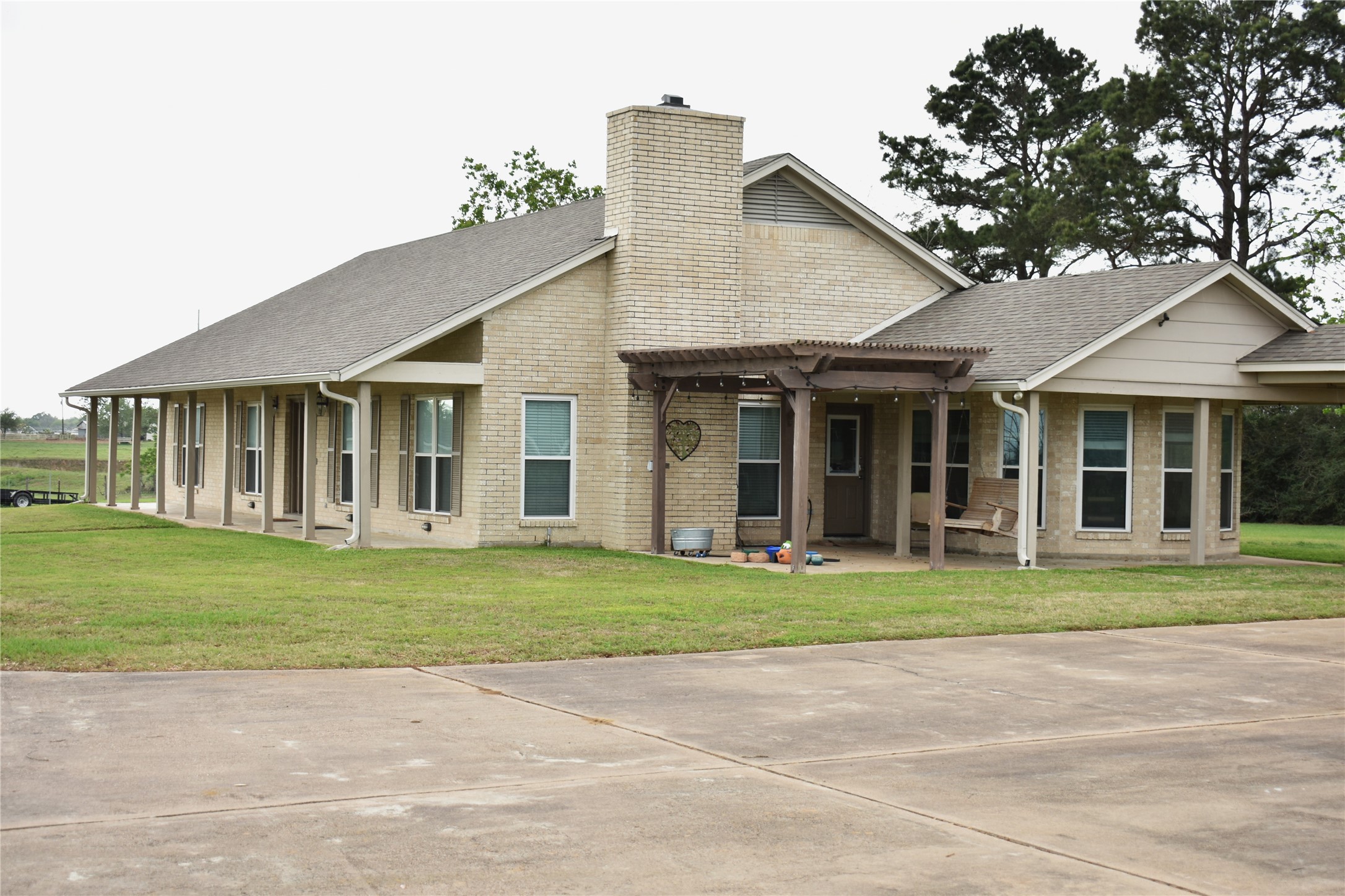 35564 Brumlow Road Hempstead, TX 77445 - Photo 4 of 18 a front view of a house with a garden
