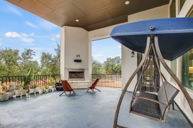 a view of a livingroom with furniture and staircase