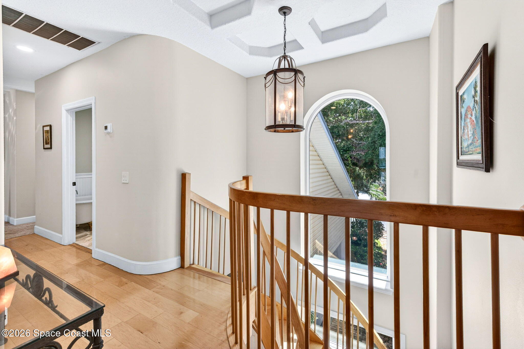 5930 Riverside Drive Melbourne Beach, FL 32951 - Photo 30 of 65 Second floor staircase