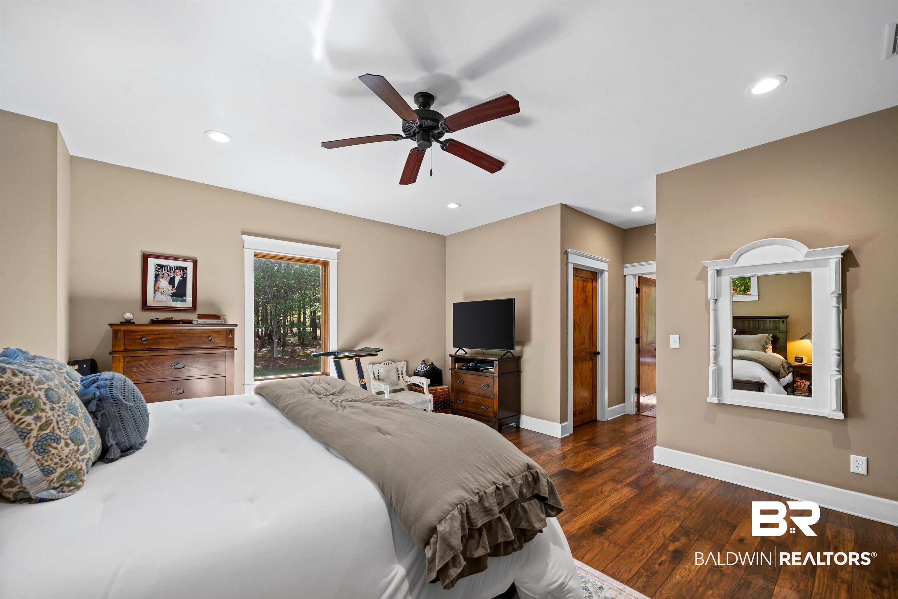 47252 Emmons Road Bay Minette, AL 36507 - Photo 24 of 50 Bedroom featuring dark wood-type flooring, access to outside, a closet, recessed lighting, and ceiling fan