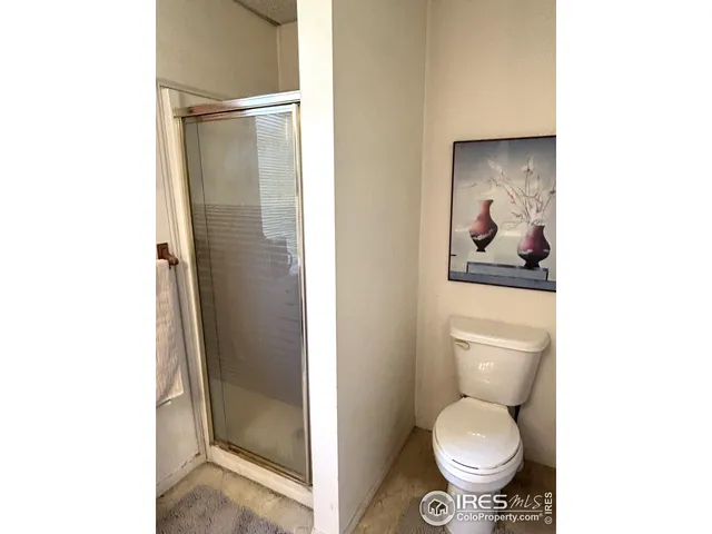 a bathroom with a toilet and a sink