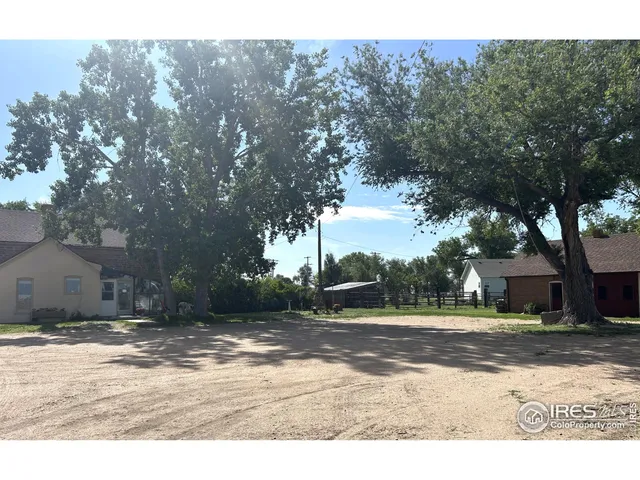 an aerial view of a houses with outdoor space