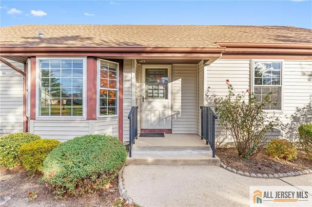 a front view of a house with a porch
