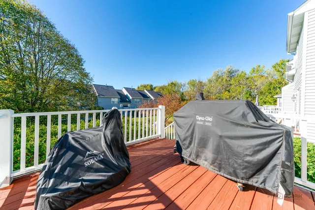 a view of a two chairs in the deck