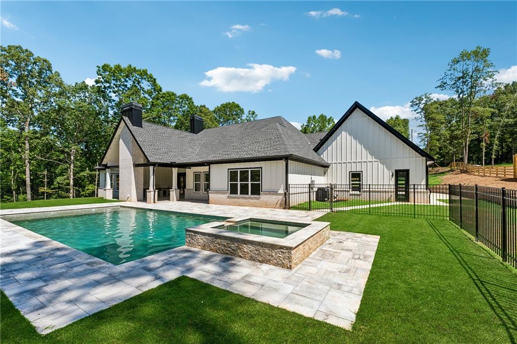 1622 Double Springs Monroe, GA 30656 - Photo 3 of 40 a front view of a house with garden