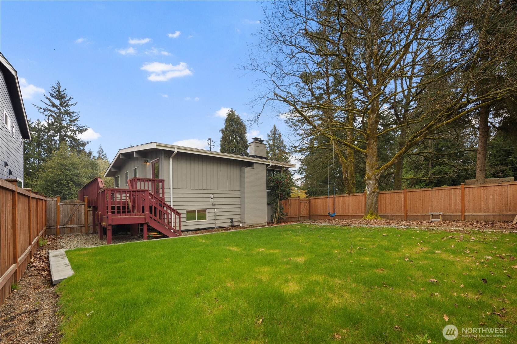 9 216th Street Southeast Bothell, WA 98021 - Photo 24 of 28 a view of a house with a yard