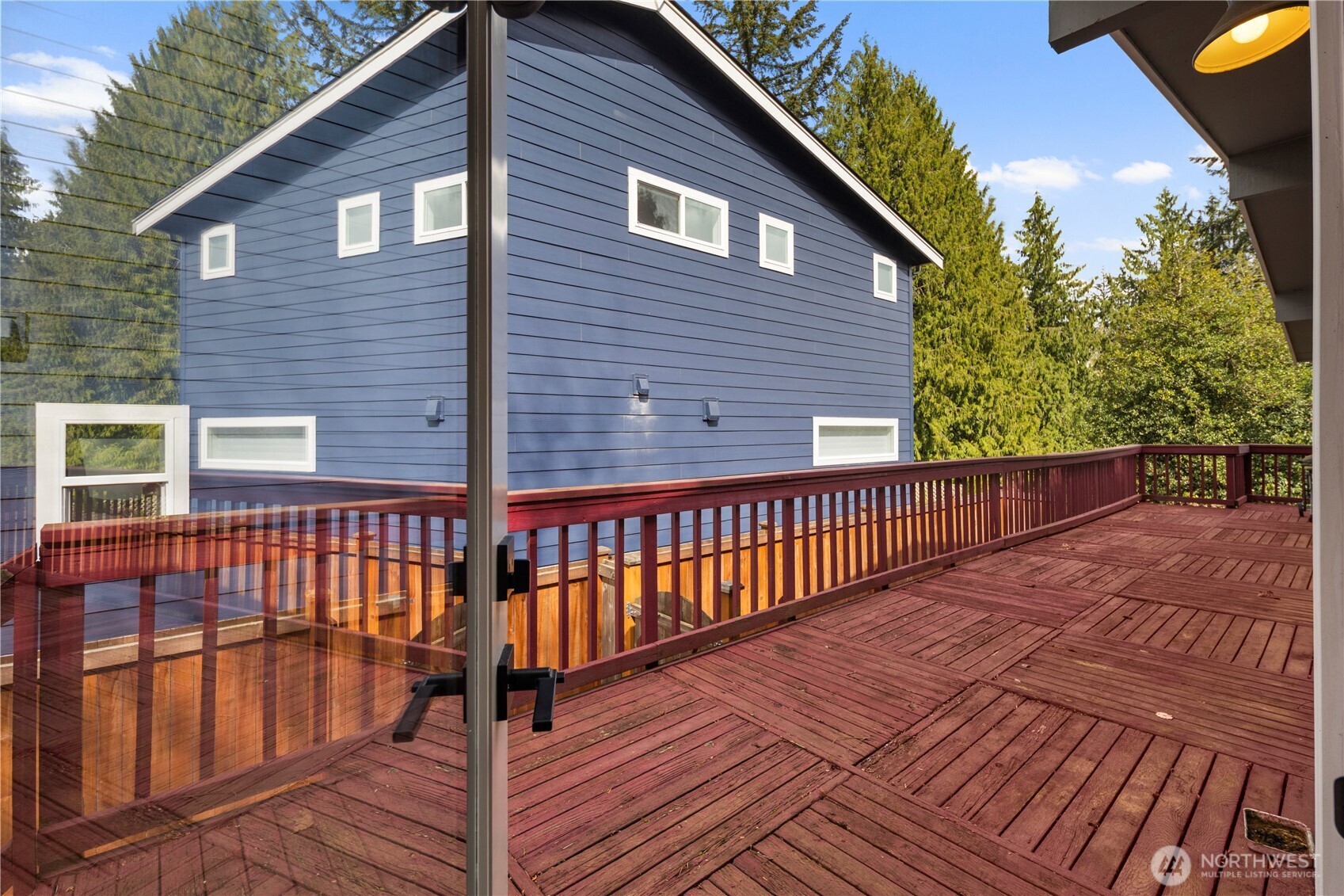 9 216th Street Southeast Bothell, WA 98021 - Photo 26 of 28 a view of a brick house with wooden fence