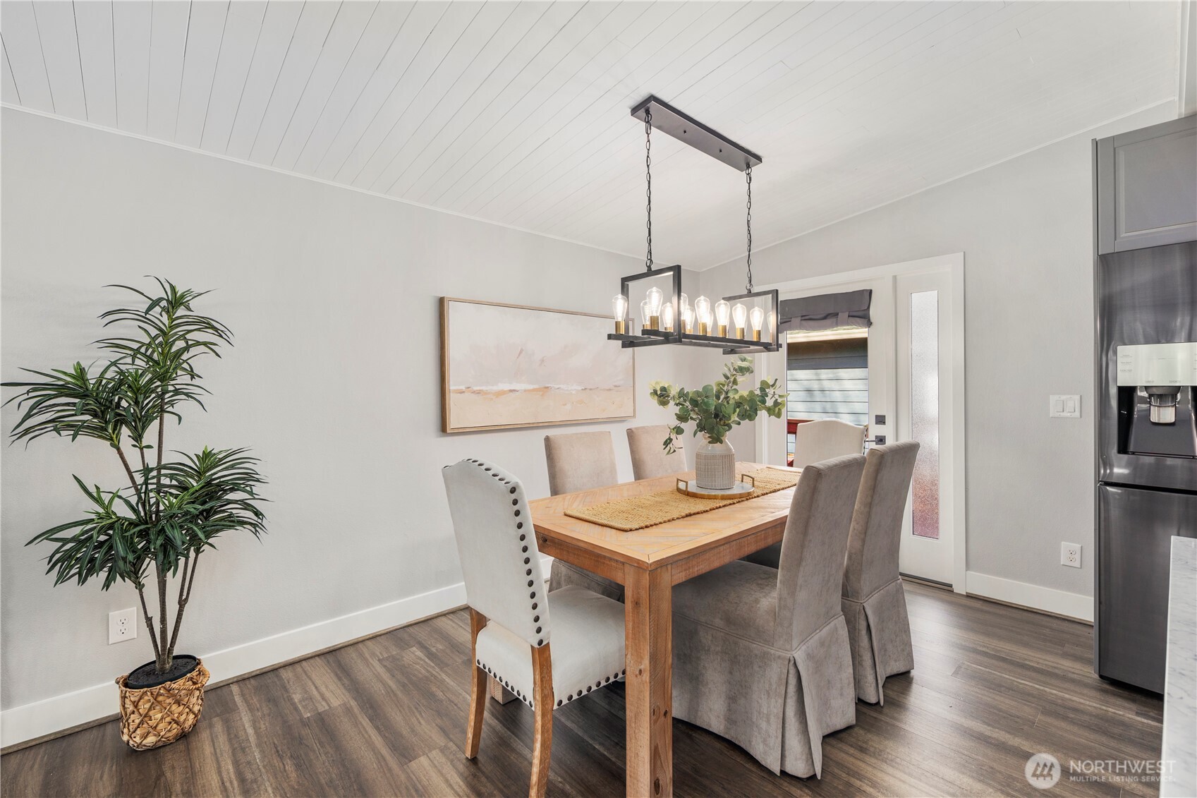 9 216th Street Southeast Bothell, WA 98021 - Photo 7 of 28 a view of a dining room with furniture wooden floor and chandelier