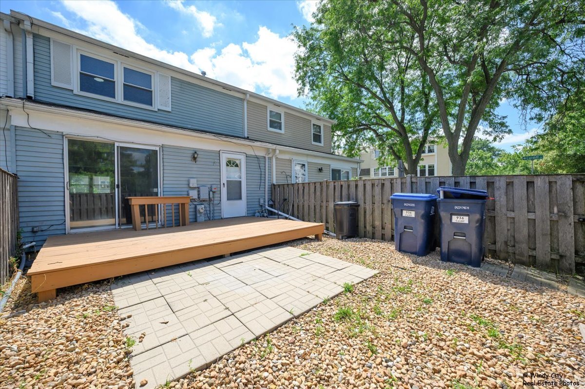 936 Cardiff Court Schaumburg, IL 60169 - Photo 26 of 35 a view of a house with backyard and sitting area