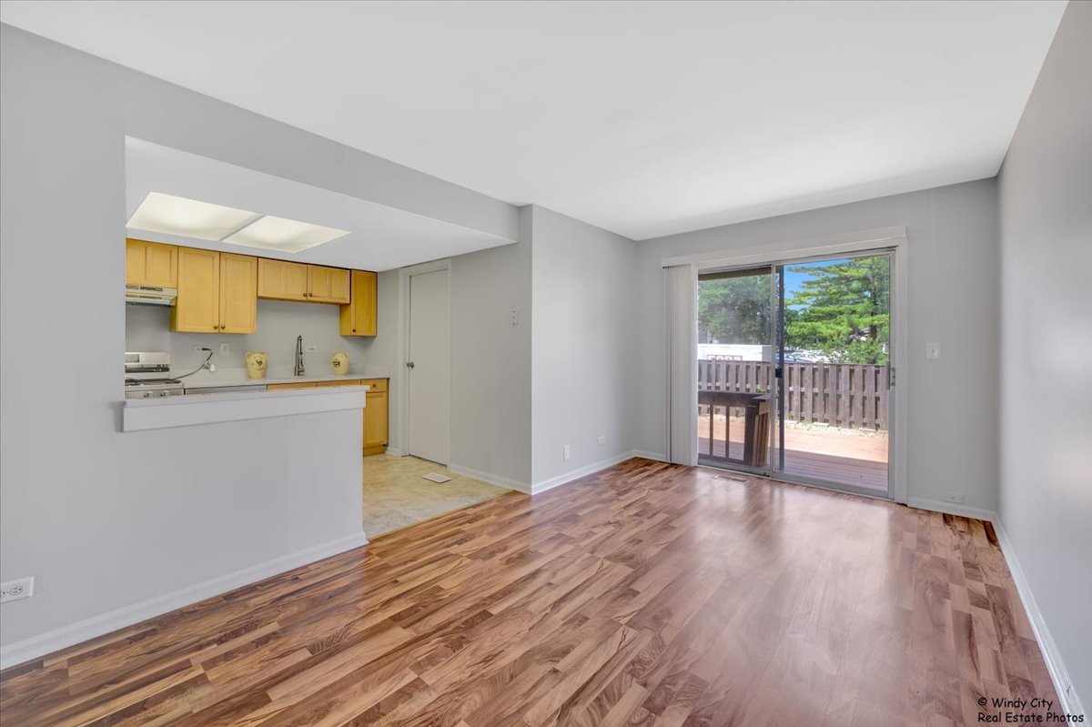 936 Cardiff Court Schaumburg, IL 60169 - Photo 4 of 35 a view of kitchen with wooden floor