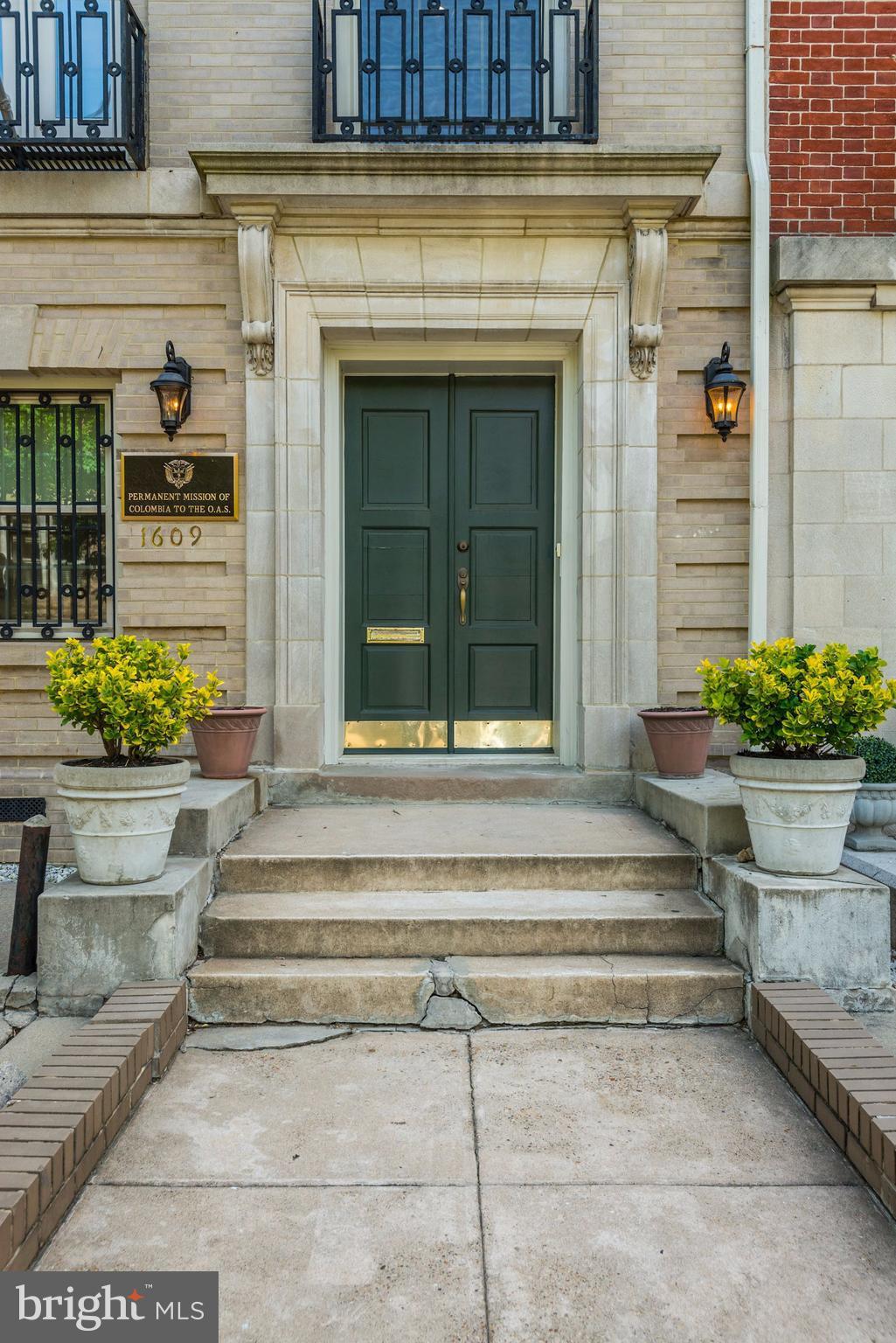 1609 22nd Street Northwest Washington, DC 20008 - Photo 2 of 24 a view of a house with potted plants and a potted plant