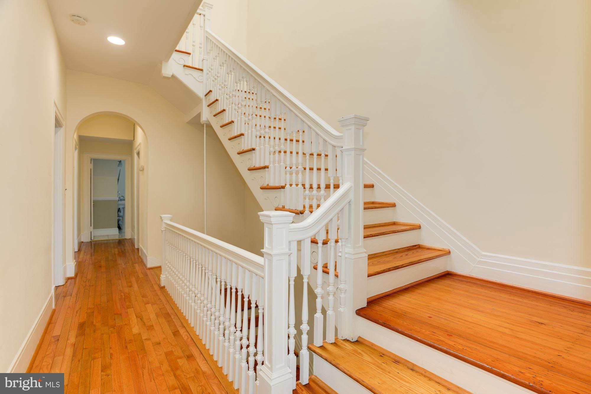 1609 22nd Street Northwest Washington, DC 20008 - Photo 12 of 24 a view of staircase with white walls and railing