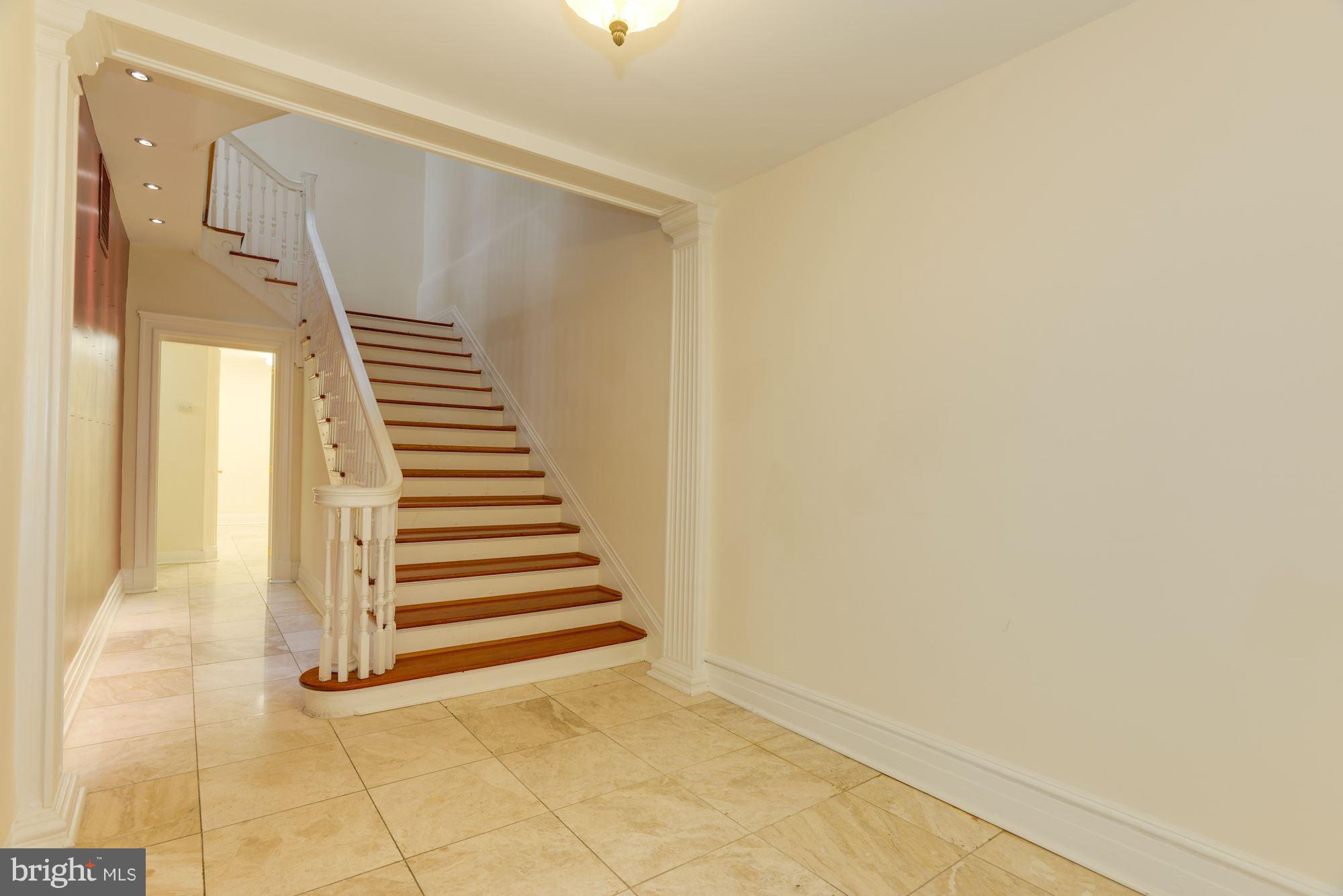 1609 22nd Street Northwest Washington, DC 20008 - Photo 3 of 24 a view of a room with stairs